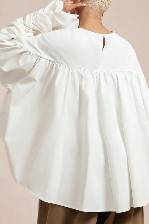Cloud Nine white ruffle top back view