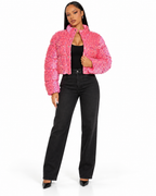 Sequence Pink Puffer jacket front view with solid black jeans